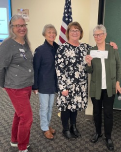 Pendleton CSM Jana Divine presenting donation to members of Altrusa International.