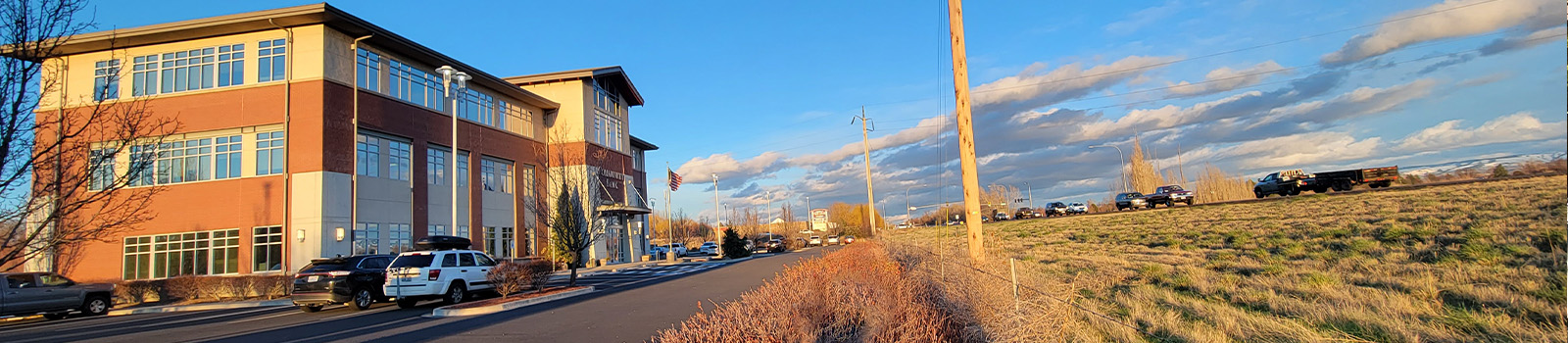 Panoramic photo of the College place location next to the highway