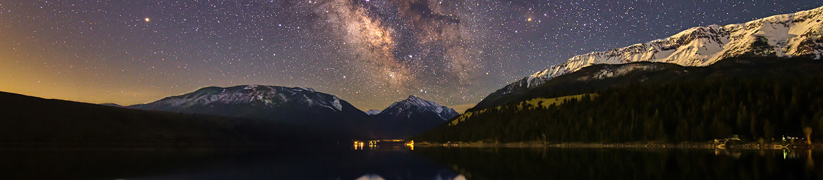 Wallowa Lake at night with astrological sky effect