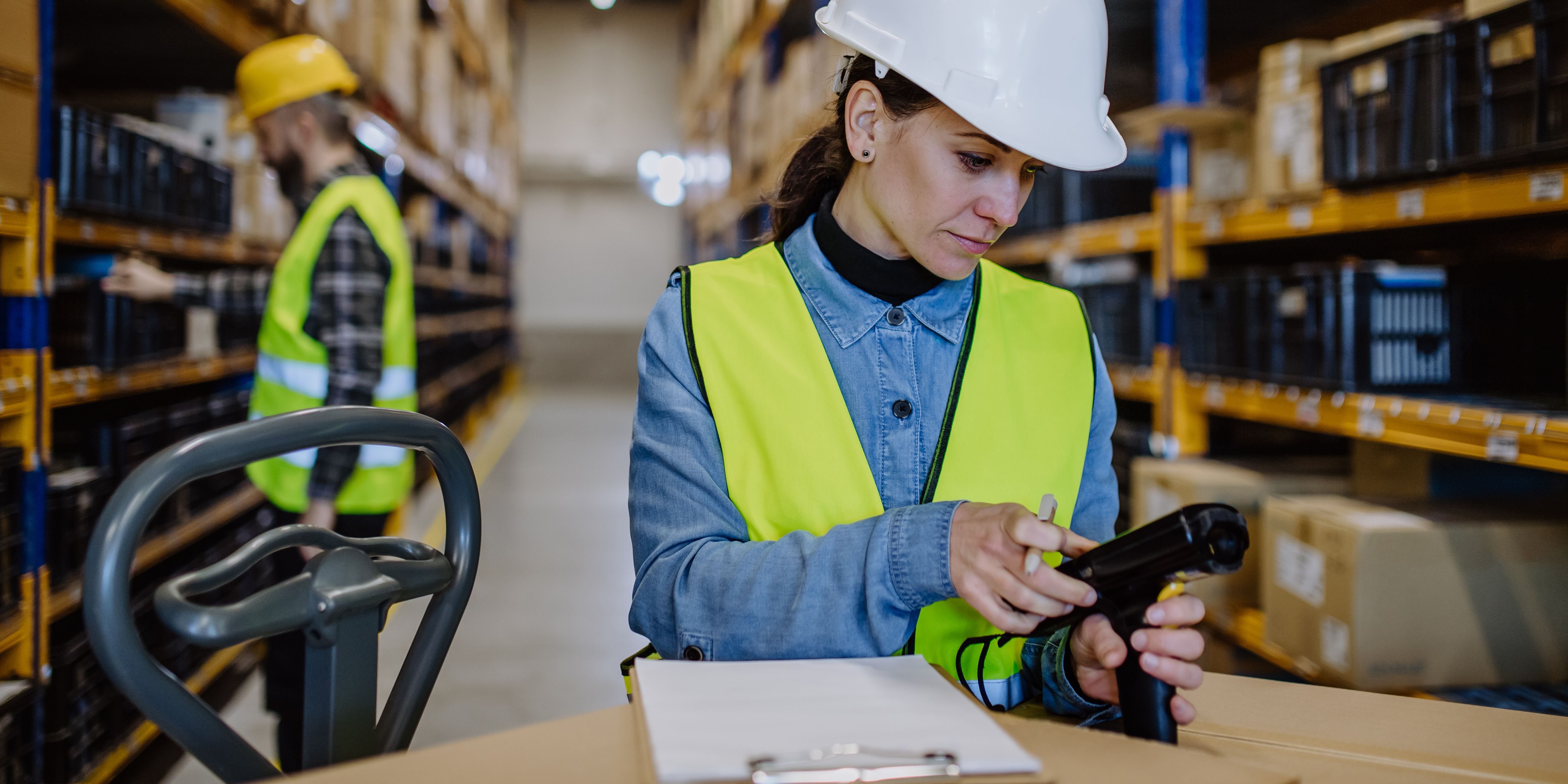 Female scanning an item in a warehouse 